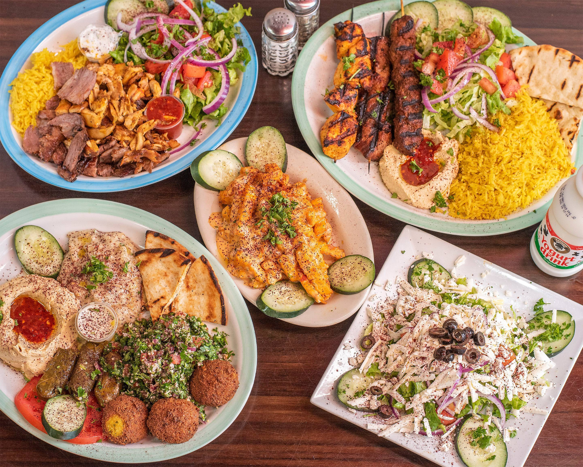 Al Basha Grill Mediterranean feast with platters, salads and appetizers